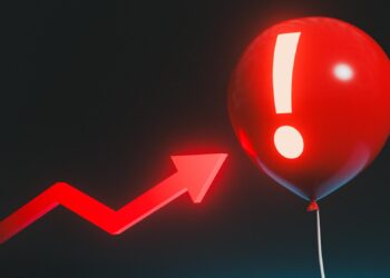 Üzerinde ünlem işareti bulunan kırmızı bir balon ve yükselen kırmızı ok.